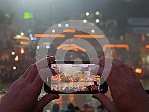 Filming the evening Hindu ceremony on the River Ganges in Hardiwar