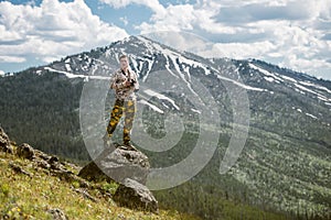 Tourist man photographer taking photos and enjoy the view of mountains in Yellowstone National Park