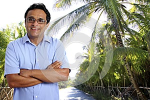 Tourist man in tropical palm tree caribbean
