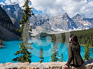 Tourist at Moraine Lake in Banff National Park, Alberta, Canada