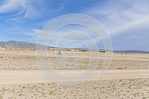 Tourist motorcyclist in the steppes of the Mongolian Altai