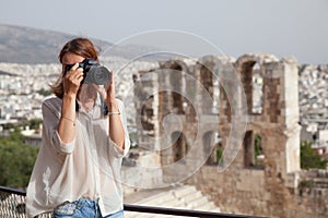 The tourist near the Acropolis of Athens, Greece