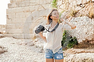 The tourist near the Acropolis of Athens, Greece