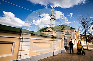 Tourist near walls of mosque