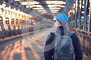 Tourist on the old iron bridge