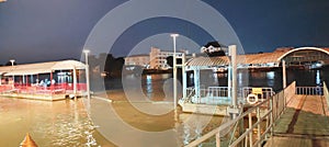 Tourist passenger pier for rivers and canals at night