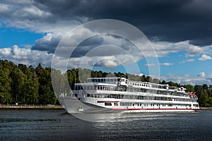 Tourist passenger ship on Moscow Canal river in summer day