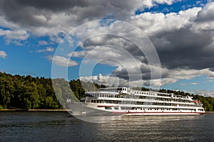 Tourist passenger ship on Moscow Canal river in summer day