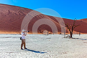 Tourist with a photo bag