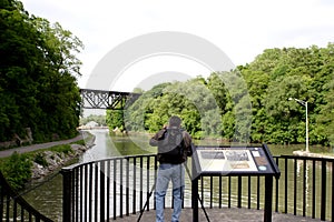 Tourist Photographing A Bridge