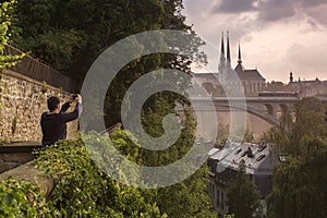 Tourist photographing Luxembourg city