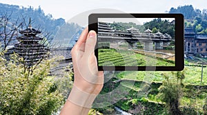 tourist photographs Fengyu Wind and Rain Bridge