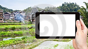 tourist photographs rice fields in Chengyang