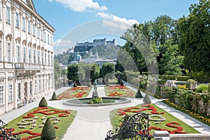 tourist place Salzburg, view to Mirabellgarten and the old castle