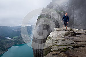 Tourist on Prekestolen rock