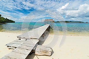 Tourist resort and jetty on scenic tropical beach in Indonesia