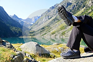 Tourist resting at Gaube lake. Pyrenees mountain.