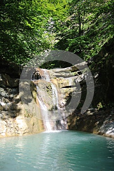 Tourist route along Kuago river - one of cascading waterfalls