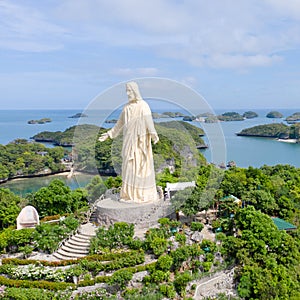 Tourist routes in the Philippines. Statue of Jesus Christ on Pilgrimage island in Hundred Islands National Park, Pangasinan,