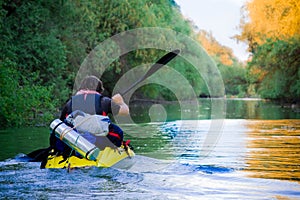 Tourist sailing on kayak