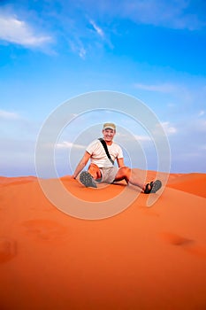 Tourist on a sand dunes