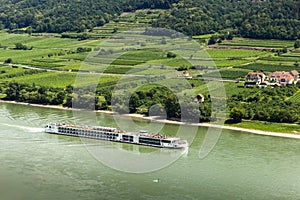 Tourist ship on the Danube river in Wachau valley.