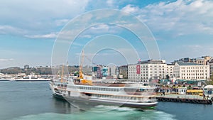 Tourist ship and ferris traffic on Bosphorus timelapse view from Galata Bridge in Istanbul, Turkey