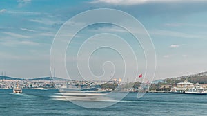 Tourist ship and ferris traffic on Bosphorus timelapse view from Galata Bridge in Istanbul, Turkey