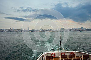 Tourist ship sails on the Bosphor in the nice Istanbul center