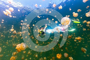 Tourist snorkeling in Jellyfish Lake