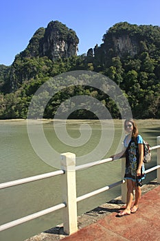 Tourist standing on the pier