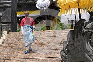 Tourist on the steps of the temple. Indonesia. Bali