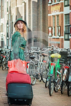 Tourist with suitcases in Amsterdam