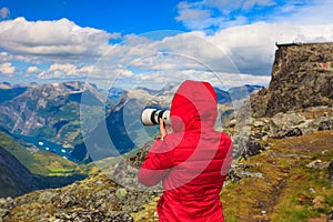 Tourist taking photo from Dalsnibba area Norway