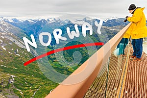 Tourist taking photo from Dalsnibba viewpoint Norway