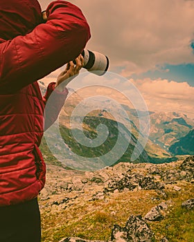 Tourist taking photo from Dalsnibba viewpoint Norway