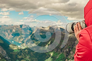 Tourist taking photo from Dalsnibba viewpoint Norway