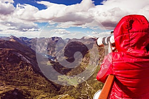 Tourist taking photo from Dalsnibba viewpoint Norway