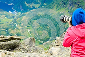 Tourist taking photo from Dalsnibba viewpoint Norway