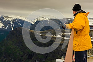 Tourist taking photo from Dalsnibba viewpoint Norway