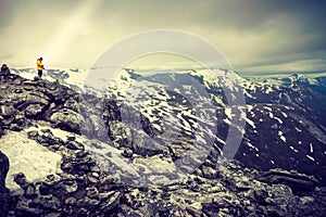 Tourist taking photo from Dalsnibba viewpoint Norway