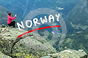 Tourist taking photo from Dalsnibba viewpoint Norway