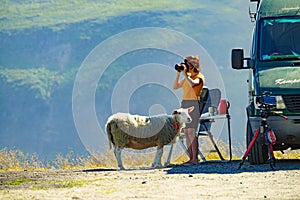 Tourist taking photo in norwegian nature