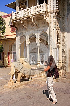 Tourist taking photo of Rajendra Pol in Jaipur City Palace, Rajasthan, India