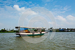 Tourist taxi boat on the Chao Phraya River in Bangkok, Thailan