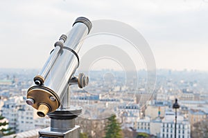 Tourist telescope mounted near Sacre Coeur in Paris