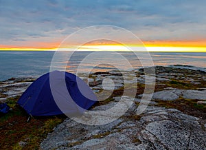 Tourist tent on the coast of Barents Sea