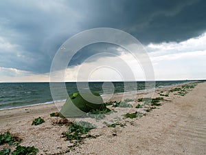 Tourist tent on uninhabited seashore