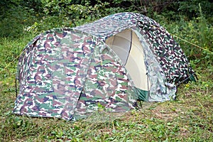 Tourist tent in the woods