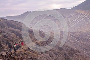 Tourist on tracking in Ijen Crater, East Java